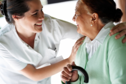 nurse and elder talking to each other